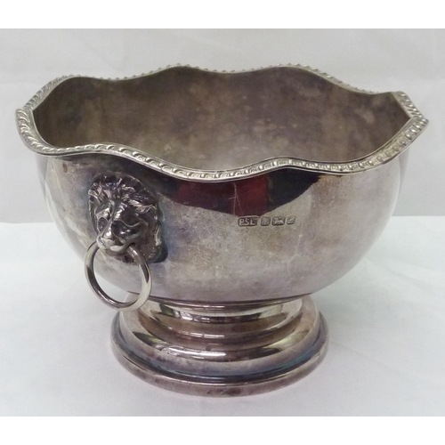 421 - A silver pedestal rose bowl having lion head ring handles, late 20th cent.  A/F interior corroded / ... 