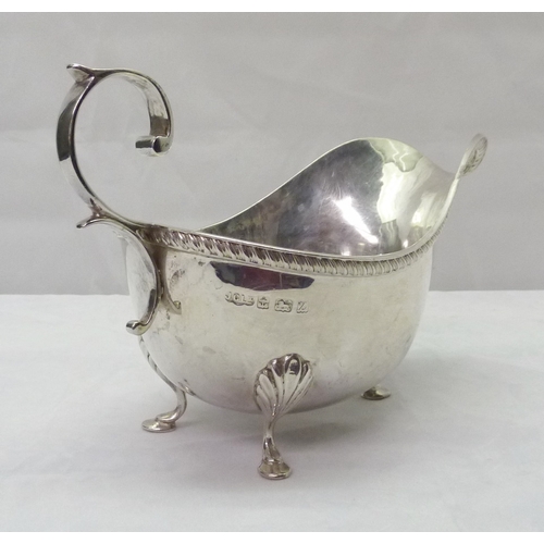 425 - Two silver sauce boats, both standing on hoof feet, early 20th cent.  Larger sauce boat 180mm long /... 