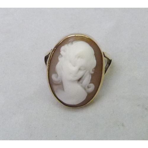 377 - A shell carved cameo in an unmarked yellow metal ring setting, head 20 x 15mm oval; a shell carved c... 