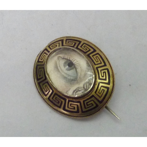 379 - A lover's eye brooch, early 19th cent yellow metal featuring a Greek key motif design border, 35 x 2... 