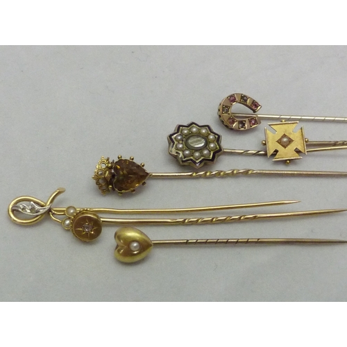 382 - Seven various stick pins incl yellow metal examples