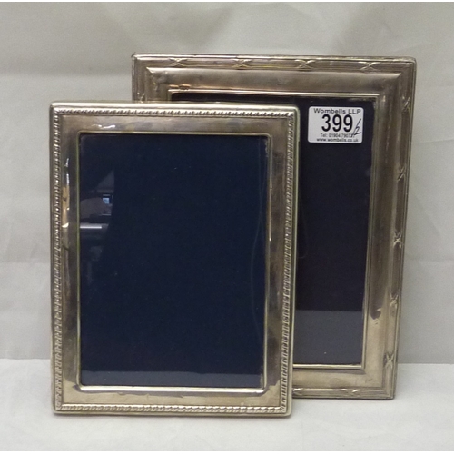 399 - Two silver photograph frames, modern.  Apertures 180 x 130mm & 200 x 140mm.