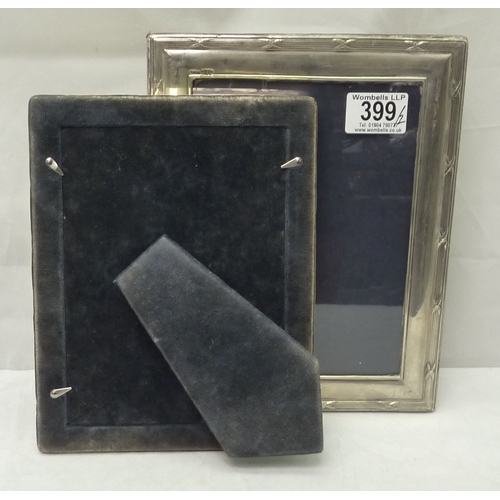 399 - Two silver photograph frames, modern.  Apertures 180 x 130mm & 200 x 140mm.