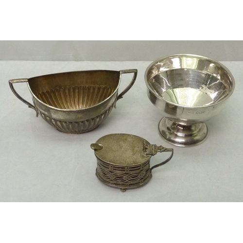 406 - Two silver sugar bowls, a silver mustard pot, a silver handled button hook, 210gr hallmarked; two si... 