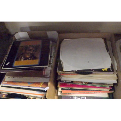 438 - A large quantity of Lps together with various VHS tapes and books (qty).