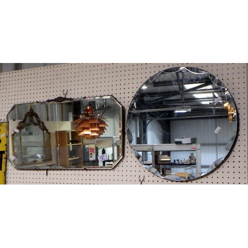 127 - Two frameless bevelled mirrors.