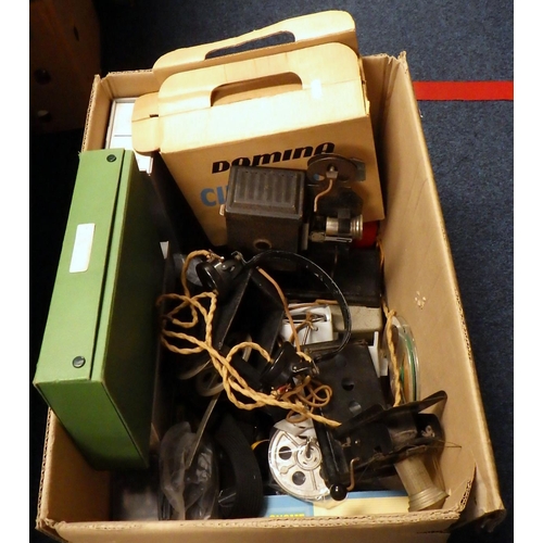 134 - A vintage projector together with slides accessories etc.