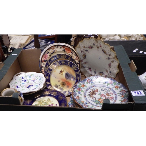 143 - A group of various plates to include Noritake, Crown Derby etc.