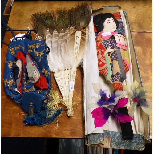 146 - An Oriental silk draw string purse together with a pr of silk shoes, a bat and a fan (4).