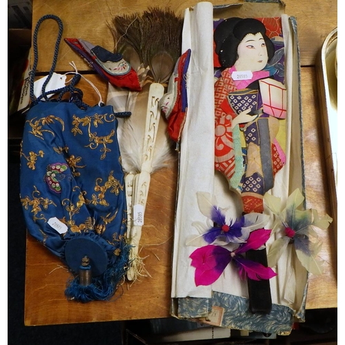 146 - An Oriental silk draw string purse together with a pr of silk shoes, a bat and a fan (4).