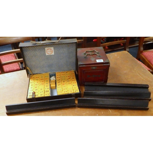 150 - A Ma Jhong wooden cased metal bound set together with a further set, wooden box af (2).