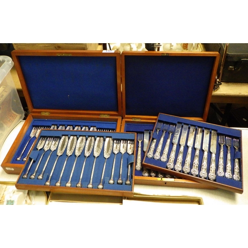 157 - Two Victorian mahogany cased cutlery sets.