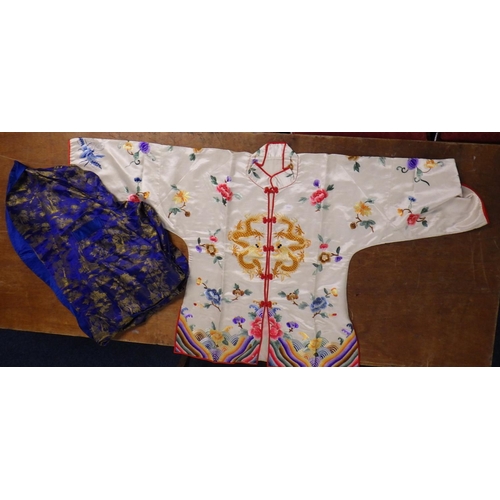 171 - A Oriental silk embroidered jacket together with a silk robe.