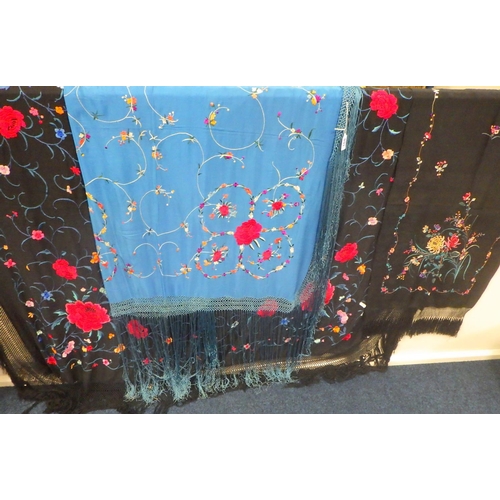 168 - Three large Oriental embroidered silk throws.
