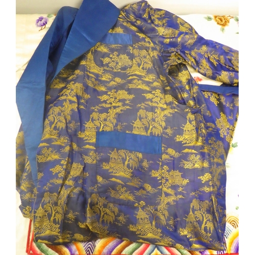 171 - A Oriental silk embroidered jacket together with a silk robe.
