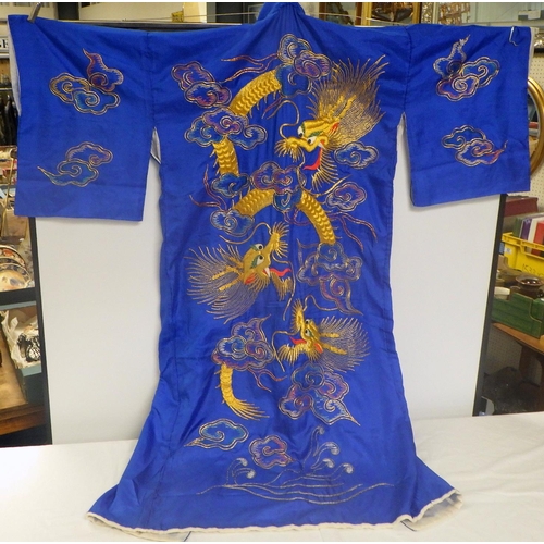 172 - A large Oriental silk heavily embroidered robe.