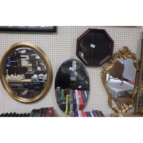 124 - Nine various modern mirrors.