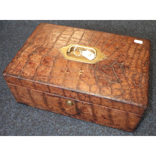 5 - A Victorian Crocodile skin box, Fisher 188 Strand London.
No key, Bramah lock 39cm wide, af.