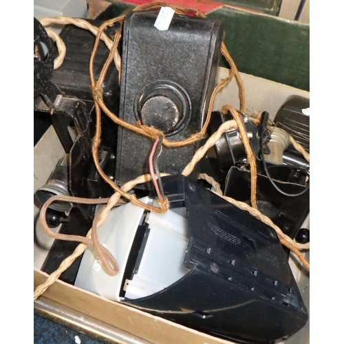 193 - A vintage projector together with slides accessories etc.