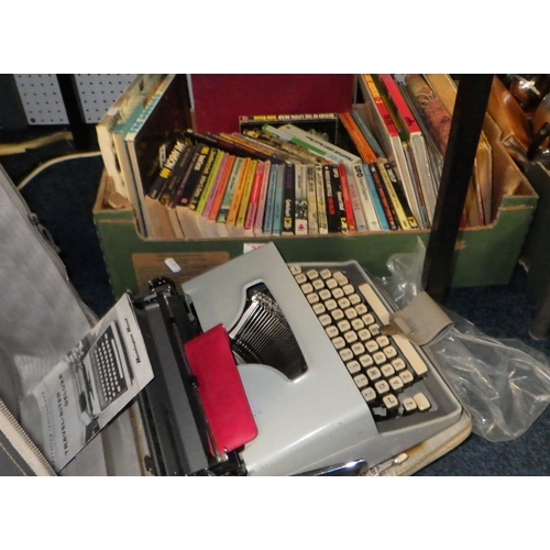 327 - A qty of books together with a Remington typewriter, maps etc (2).