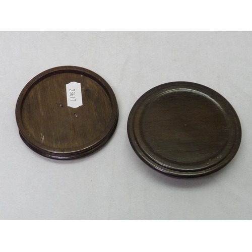 370 - A snuff or trinket box, turned oak inset with central white metal roundel engraved 