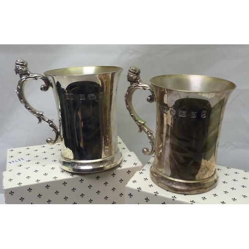 386 - A silver tankard celebrating 25 years of the Coronation of Elizabeth II, a similar Silver Jubilee ta... 