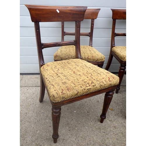 601 - A set of four reproduction tablet back dining chairs