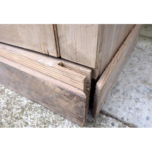 658 - A large four door pine cupboard, a/f warped, missing back and other parts, 256cm long, ex Nun Applet... 