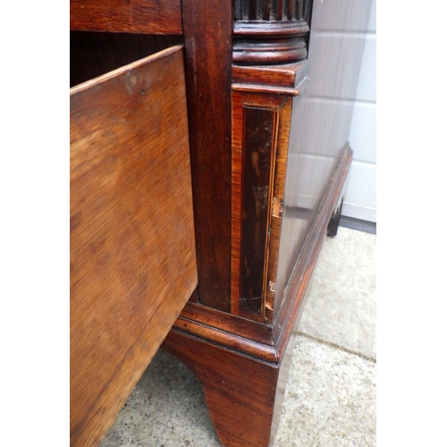 678 - A Geo III mahogany chest of drawers with fluted corners, 126cm wide