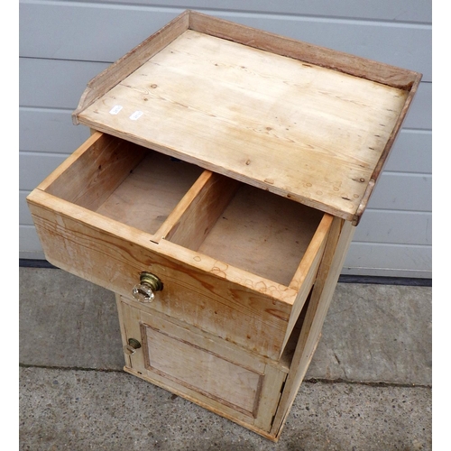 680 - A Victorian stripped pine bedside cabinet, a/f missing feet, 45cm wide