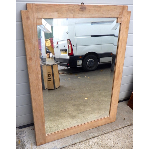 707 - A pine framed overmantel mirror, 87cm wide