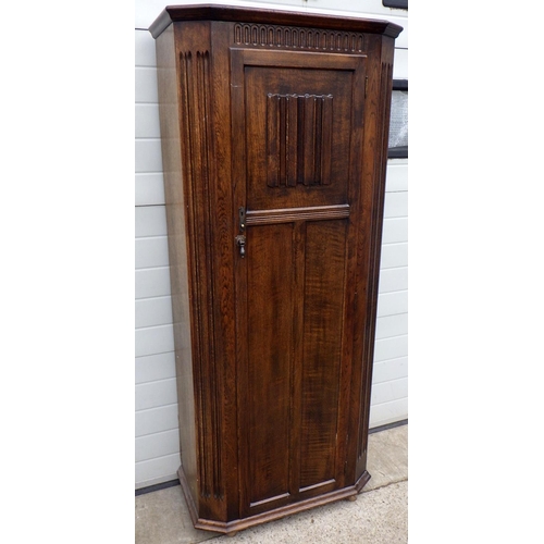 714 - A linenfold panelled oak/ply hall wardrobe, 80cm wide