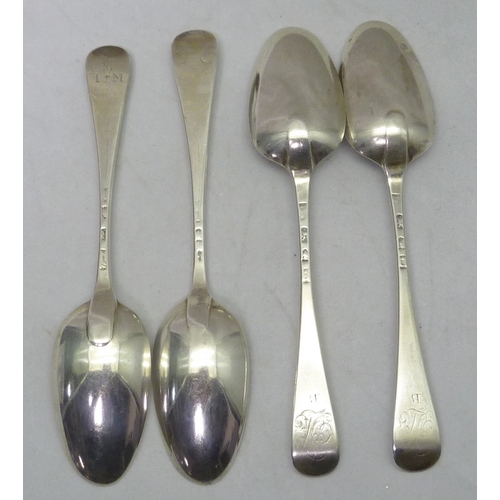 411 - A pair of George II silver hanoverian pattern table spoons, London 1759, 209mm long; two similar sin... 