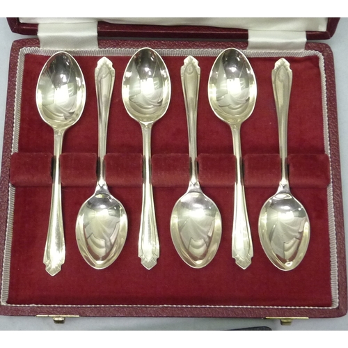 423 - Two cased sets of six silver coffee spoons; a cased set of six silver teaspoons, all 20th cent.  180... 