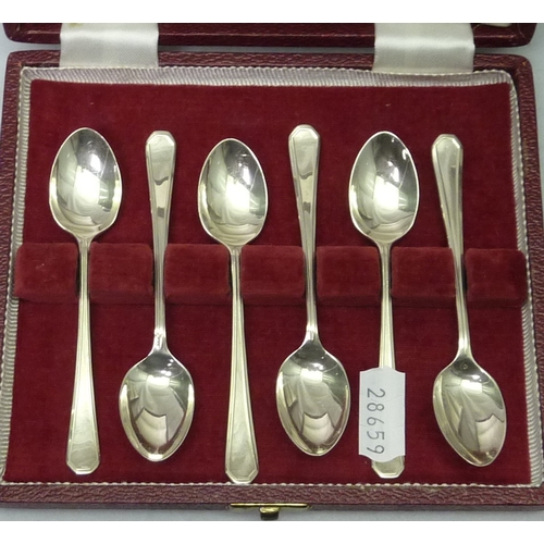 423 - Two cased sets of six silver coffee spoons; a cased set of six silver teaspoons, all 20th cent.  180... 