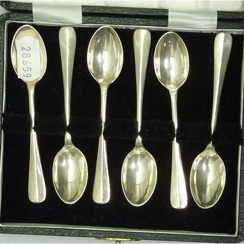 423 - Two cased sets of six silver coffee spoons; a cased set of six silver teaspoons, all 20th cent.  180... 