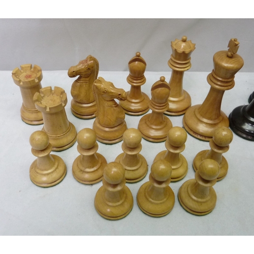 426 - A cased set of carved wood Staunton pattern chessmen by Jaques & Son, London.