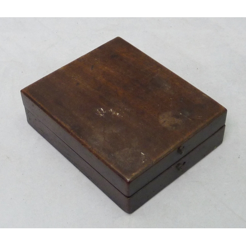 427 - A mahogany cased dry card compass signed John Robbins London.