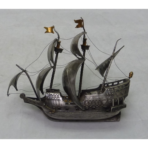 442 - A silver model of a sailing galleon, late 20th cent.  140mm long / 280gr gross