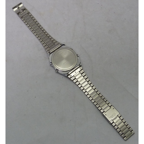 447 - A Timex Quartz digital chronograph alarm bracelet watch, c1980s.  35mm across head.