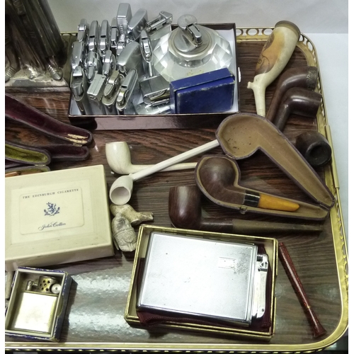 448 - A large collection of cigarette lighters, smokers pipes, cigarette cases and holders etc, many a/f.