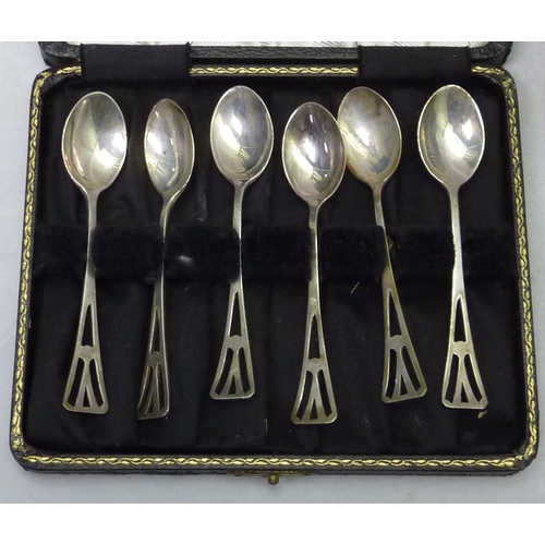 457 - A set of Art Deco influence silver teaspoons, cased; a silver bowl, 108mm diameter; a silver and har... 