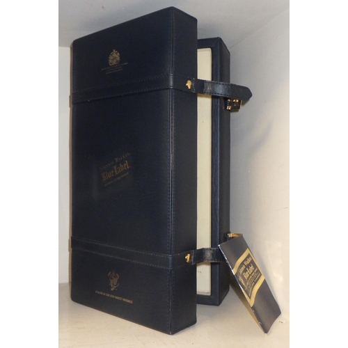 284 - Johnnie Walker Blue Label Whisky 75cl in blue presentation suitcase.