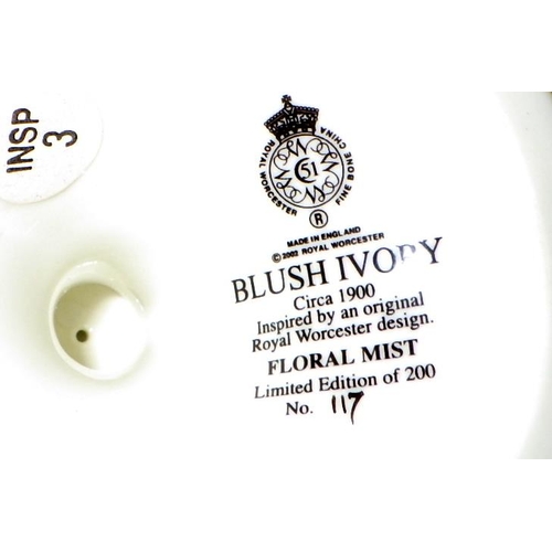 223 - A pair of Royal Worcester Ivory Blush Golden Bouquet Limited Edition of 200 no:117 lidded urns 26cm ... 