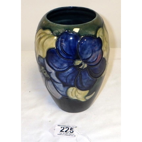 225 - A Moorcroft Clematis vase 18cm tall with paper label