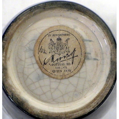 225 - A Moorcroft Clematis vase 18cm tall with paper label