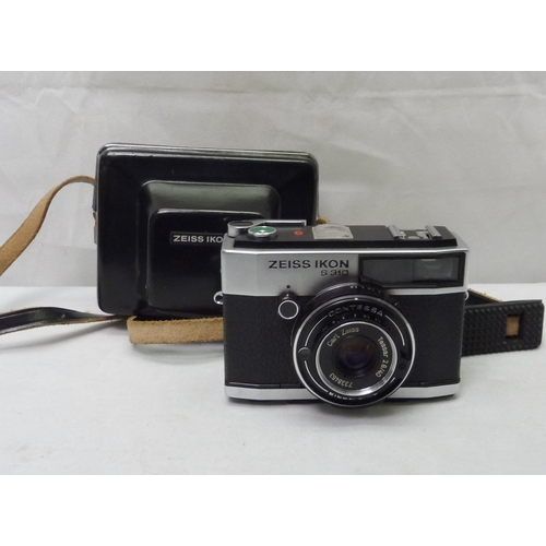 4 - A Zeiss Ikon S310 35mm compact camera in black leather ever-ready case.