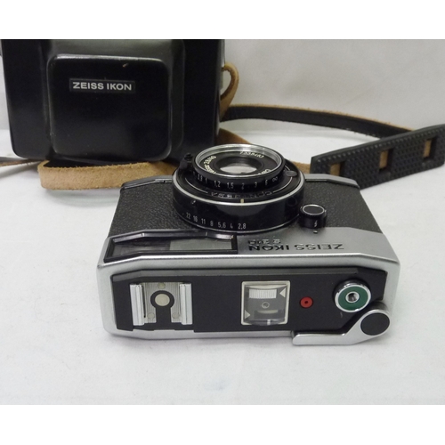 4 - A Zeiss Ikon S310 35mm compact camera in black leather ever-ready case.
