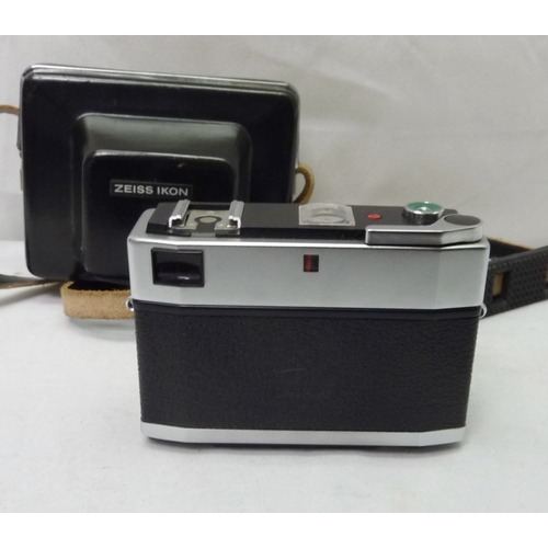 4 - A Zeiss Ikon S310 35mm compact camera in black leather ever-ready case.