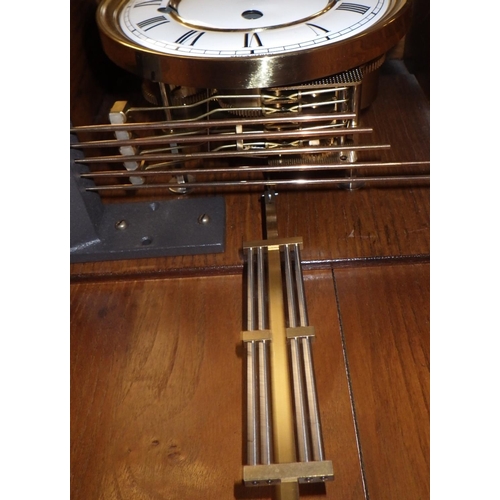 101 - A modern oak cased Westminster chime wall clock, recent service at the cost of £200